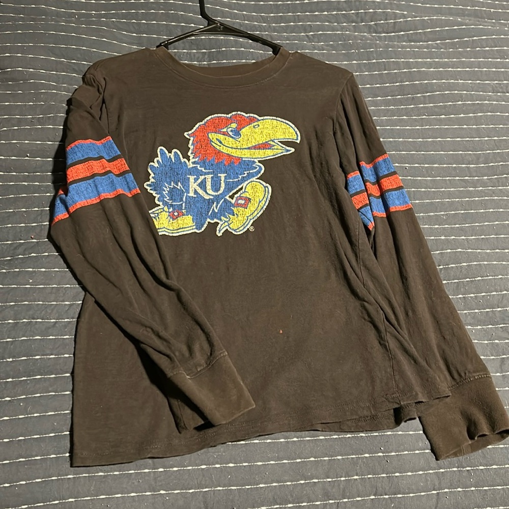 Jayhawks fanatic long sleeve tee. Aged worn-in style.